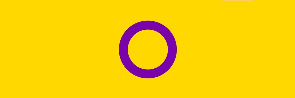 Imagen de la bandera intersexual, un círculo violeta sobre un fondo amarillo.